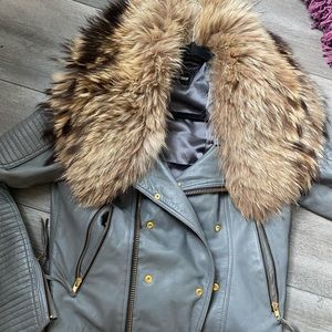 Woman’s gray leather jacket with fox fur